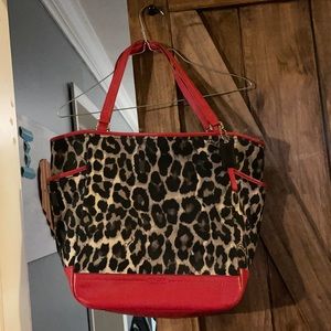 Coach handbag leopard with red.